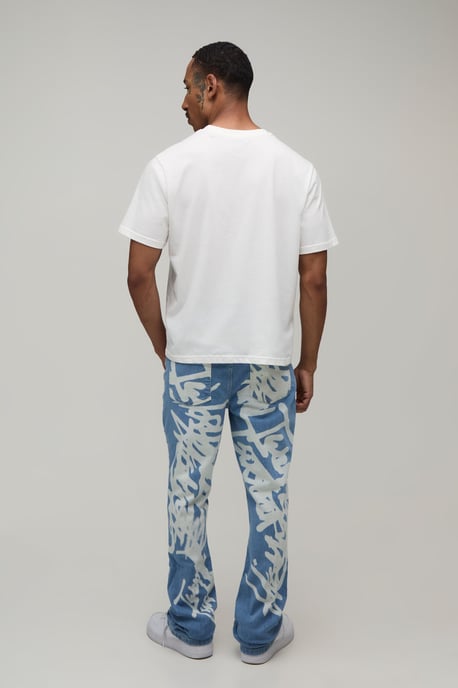 Stacked Graffiti Print Flared Jeans - Image 2