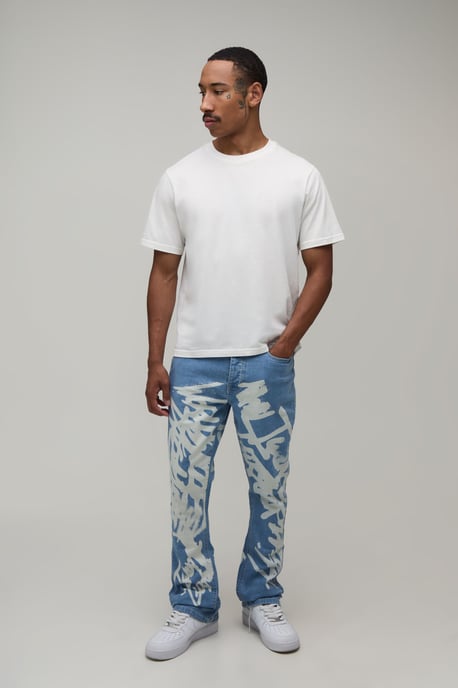 Stacked Graffiti Print Flared Jeans - Image 4