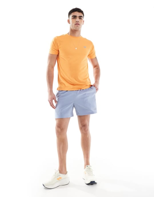 New Balance essentials 5-tum shorts i blått - Image 1