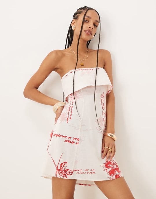 ASOS DESIGN vikbar bandeau mini sommarklänning i röd blommönster - Image 1