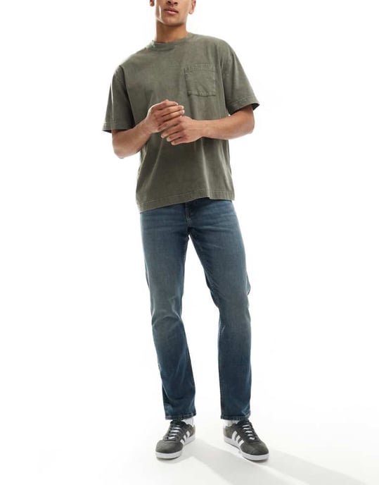 ASOS DESIGN slim fit jeans i medtvättad blå - Image 1