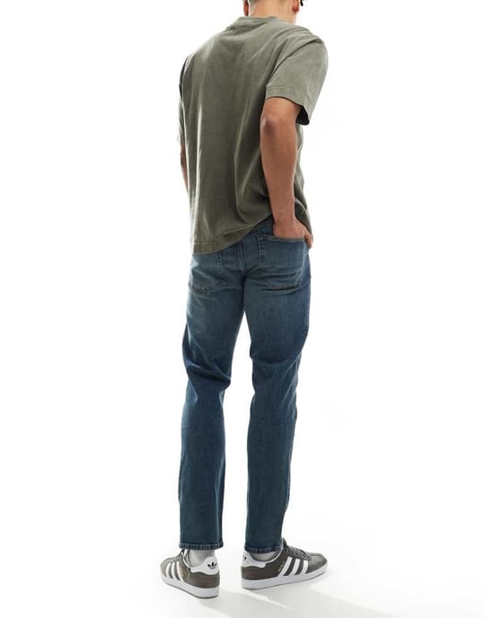 ASOS DESIGN slim fit jeans i medtvättad blå - Image 2