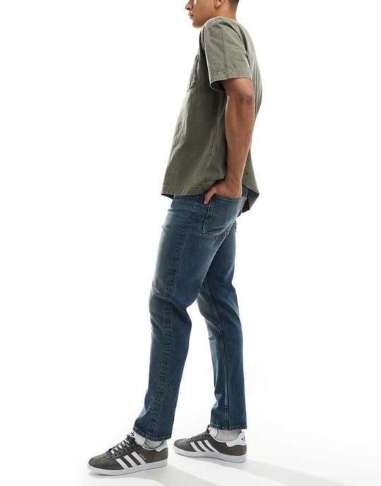 ASOS DESIGN slim fit jeans i medtvättad blå - Image 3