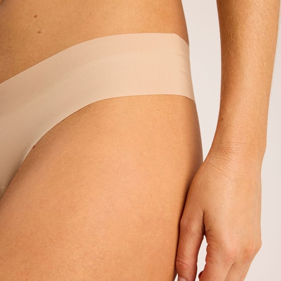 Invisible rib one size thong in beige - Image 3