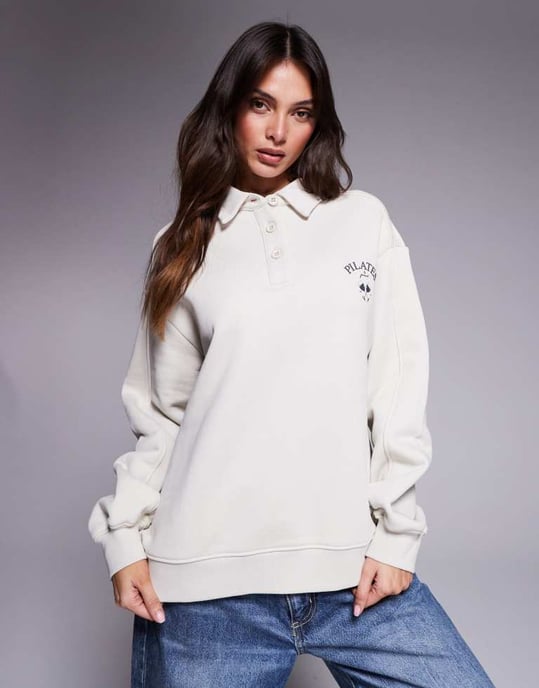 The Couture Club pilates och pinot knäpp polo jumper i off-white - Image 2