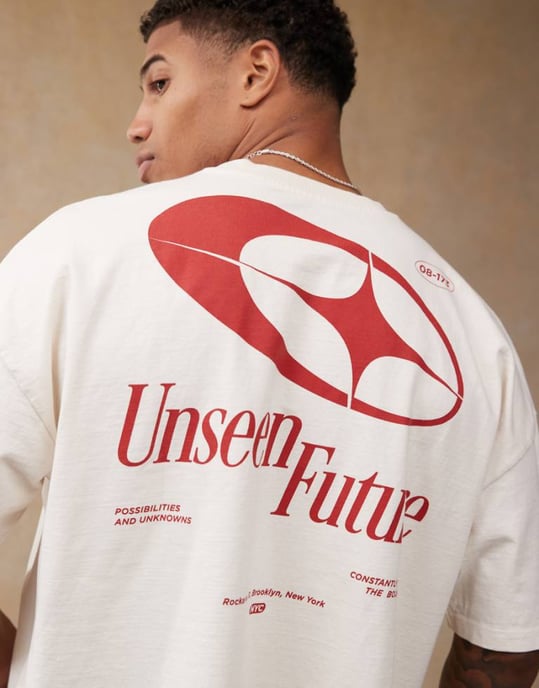 ASOS DESIGN boxy oversized tungt t-shirt med sänkt axel och ryggtryck i krämfärg - Image 1
