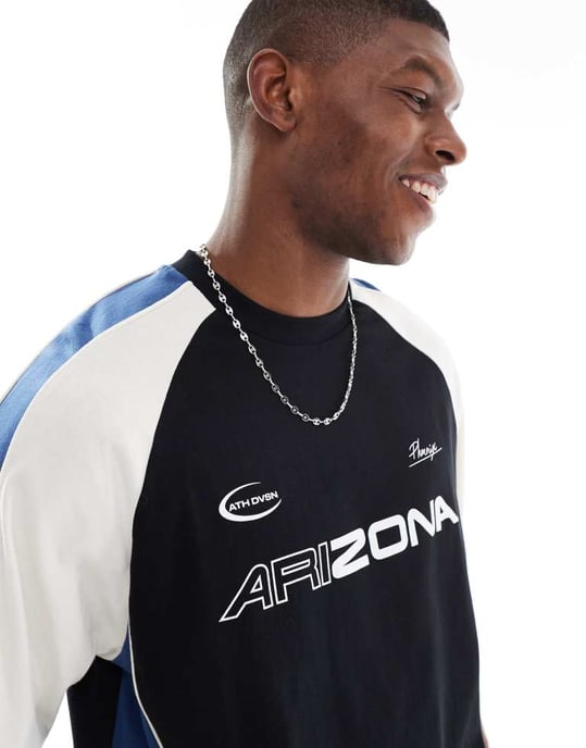 ASOS DESIGN boxig oversized t-shirt med skuren och sydd panel och sportgrafik i svart - Image 2