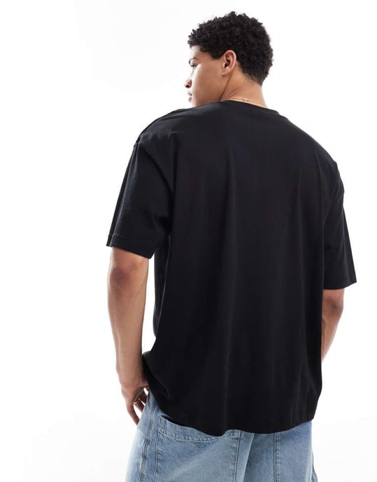 ASOS DESIGN oversized t-shirt med textgrafik i svart - Image 4