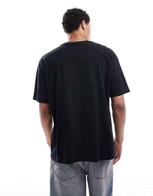 ASOS DESIGN oversized t-shirt med stadsgrafik framtill i svart - Image 4