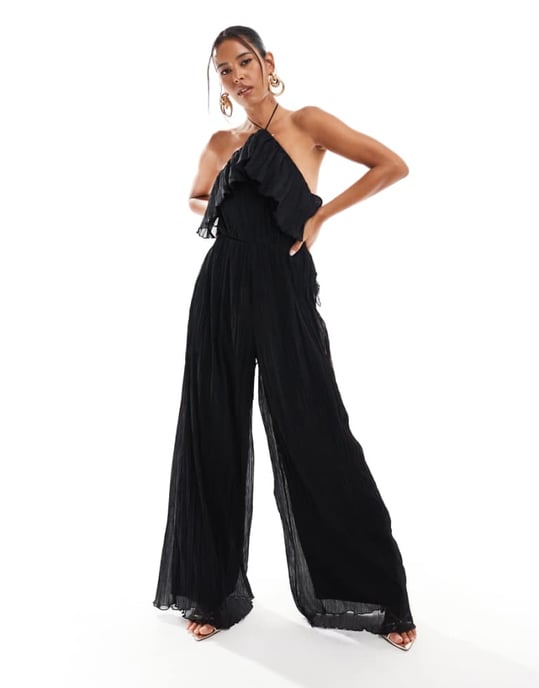 ASOS DESIGN textured halter wide leg jumpsuit with frill detail in black - Image 1