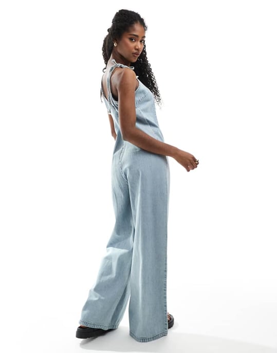 Monki lightweight denim halter neck jumpsuit in blue wash - Image 4