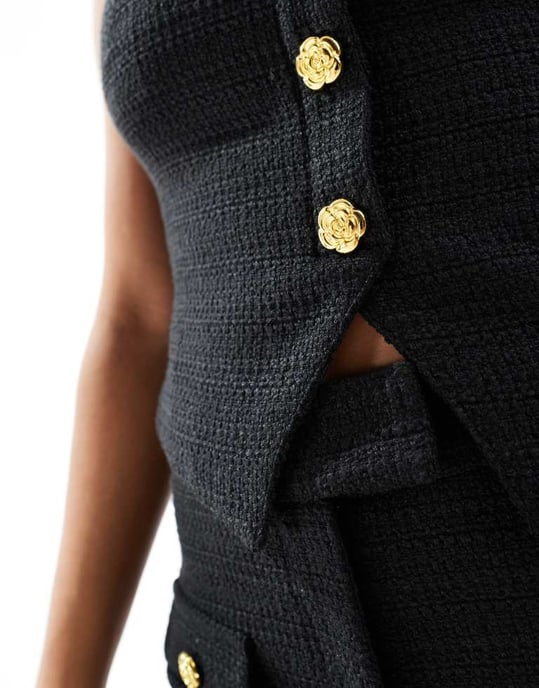 The Frolic exclusive tailored boucle bandeau split front gold flower button detail top co-ord in black - Image 3