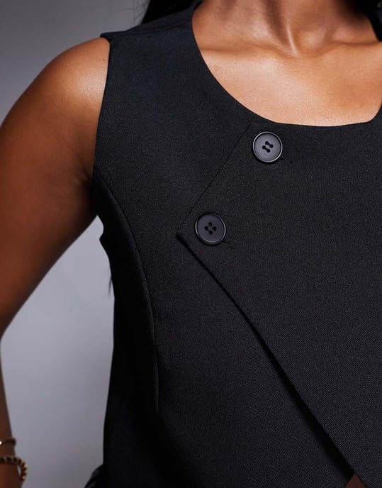 In The Style x Natalya Wright exclusive tailored asymmetric top in black - Image 2