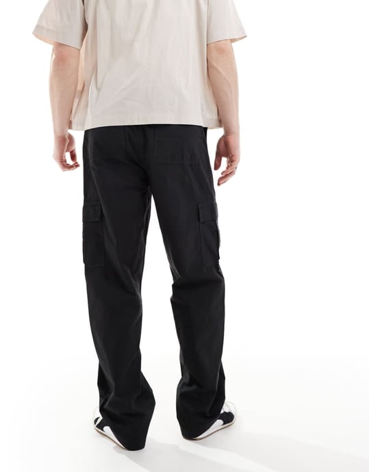 ASOS DESIGN baggy cargobyxor med resår i svart - Image 4