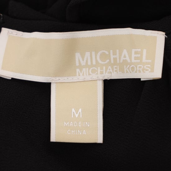 Michael Kors jumpsuit met ruches en open schouders in zwart polyester - Image 4