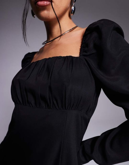 In The Style x Perrie Sian exclusive long sleeve puffball mini dress in black - Image 2