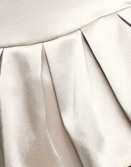 ASOS DESIGN Petite bonded satin pleated mini skirt in ivory - Image 4