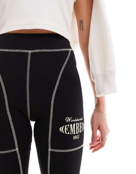 The Couture Club oversized graphic leggings with contrast stitch in black - Image 4