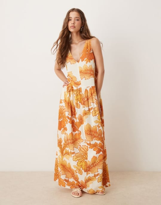 ASOS DESIGN halterneck linne midja maxi klänning i orange mönster - Image 1