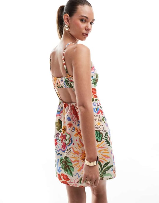 Vero Moda halterneck miniklänning i samtalande tropiskt tryck - Image 3