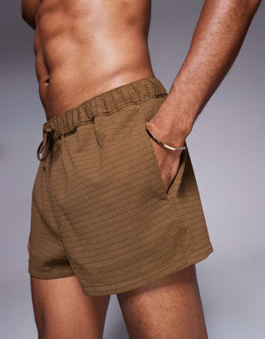 ASOS DESIGN texturerade badshorts i superkort längd i brun - Image 3