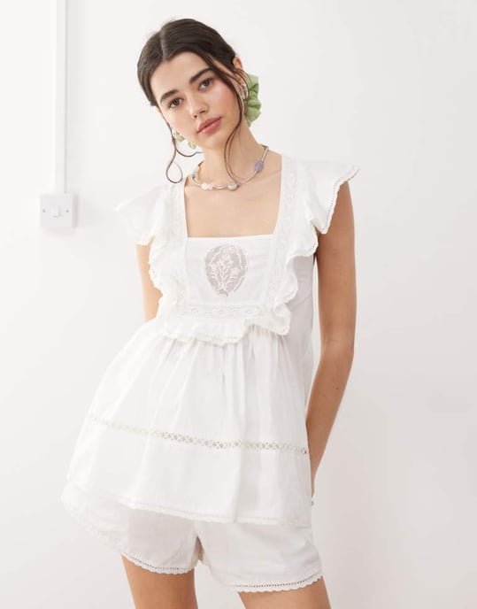 Återvunnen vintage västernsmocktop med änglavingar och broderi i vit koord - Image 1