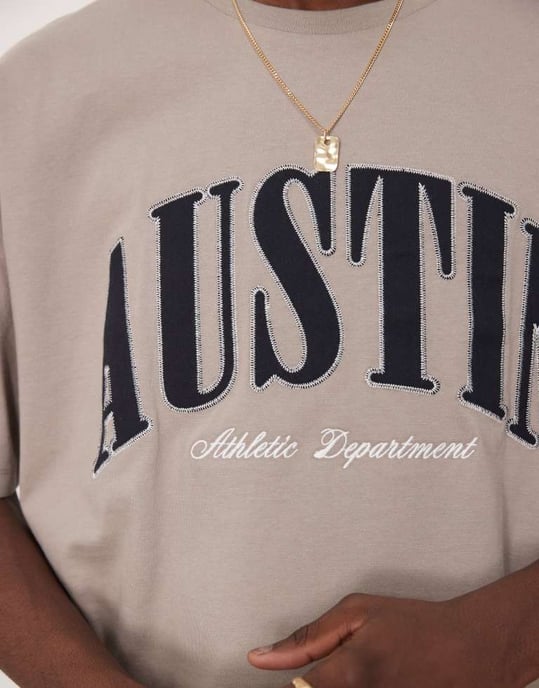ASOS DESIGN oversized t-shirt med sänkt axel och stadssygnatur i brun - Image 2