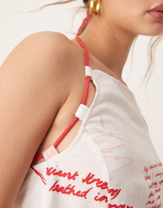 ASOS DESIGN koord halterneck top med snörningar i röd blommig mönster - Image 2