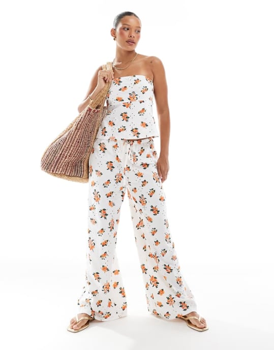 ASOS DESIGN broderad pyjamasbyxa med knytmidja i vitt och orange mönster - Image 1