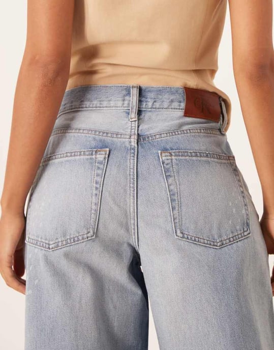 Calvin Klein Jeans vida byxor med stänkmönster i acid wash - Image 4
