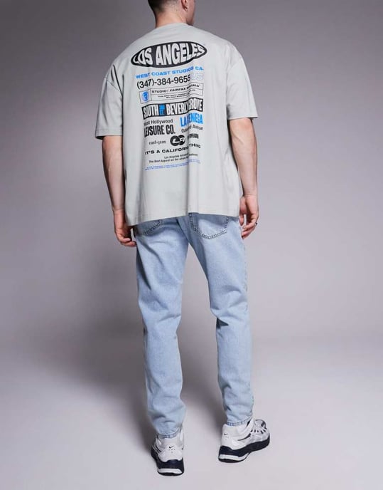 ASOS DESIGN jeans med tapered passform i ljusblå tvätt - Image 2