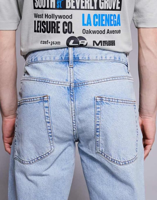 ASOS DESIGN jeans med tapered passform i ljusblå tvätt - Image 4