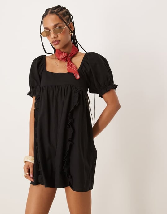 ASOS DESIGN linne babydoll playsuit med puffärmar och rosett detalj i svart - Image 1
