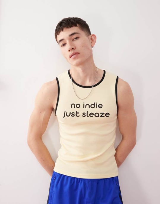 COLLUSION Festival muskelväst i gult med indie sleaze-slogan - Image 1