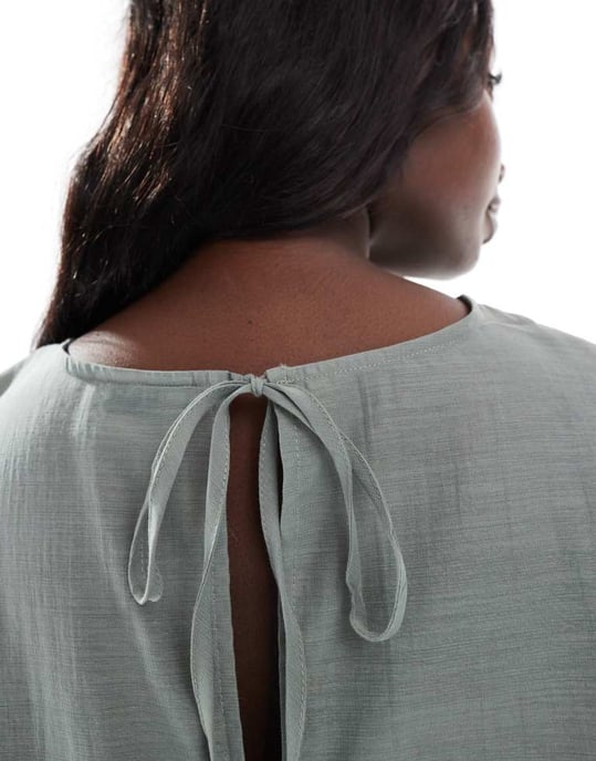 ASOS DESIGN Curve long sleeve peplum hem top in green - Image 3