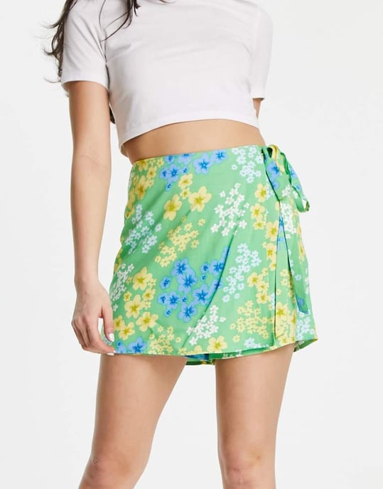 ASOS DESIGN wrap tie skort in green meadow floral print - Image 1