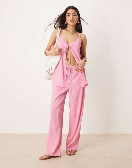 ASOS DESIGN elastiska flare-byxor i klarrosa - Image 1