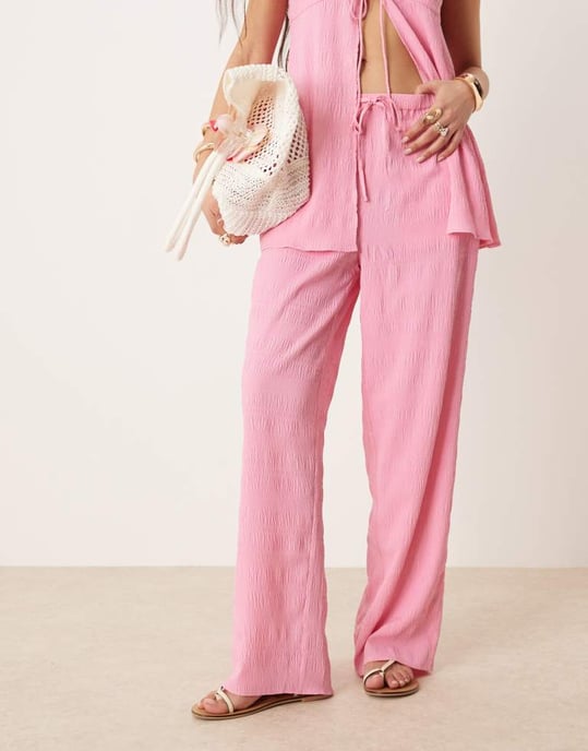 ASOS DESIGN elastiska flare-byxor i klarrosa - Image 2