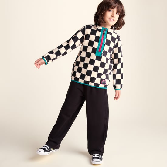 Brecknock Kids Shaun the Sheep Fleece Zip Neck - Woolly/Black Checkerboard - Image 1