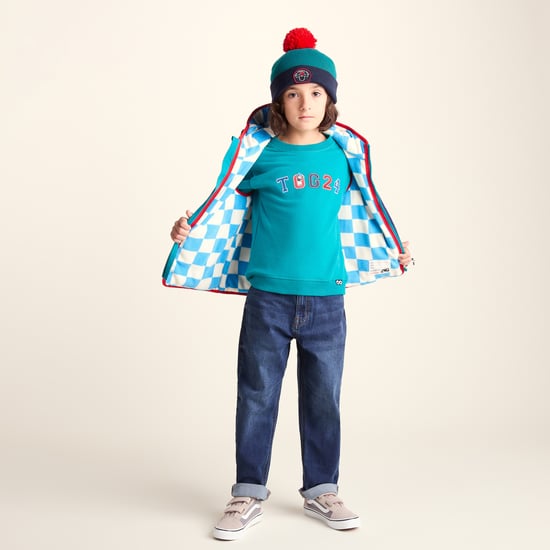 Beulah Shaun the Sheep Kids Knitted Beanie Pom Pom Hat - Peacock Green/Night Blue - Image 2