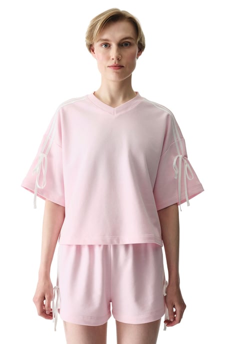 Oversized V-ringad T-shirt i bomullsblandning med rosettdetalj - Image 3