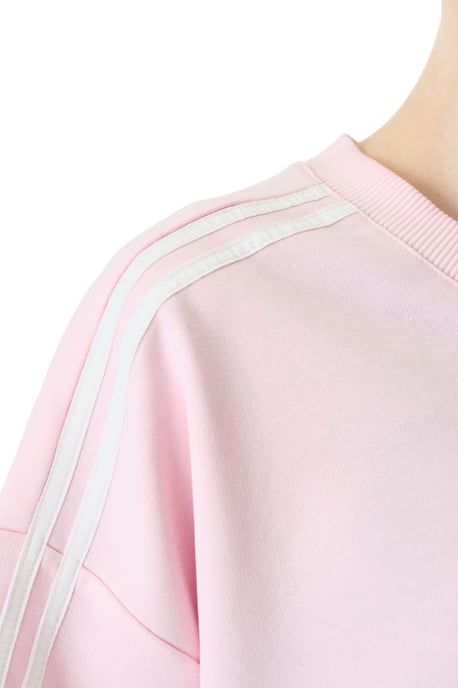 Oversized V-ringad T-shirt i bomullsblandning med rosettdetalj - Image 4