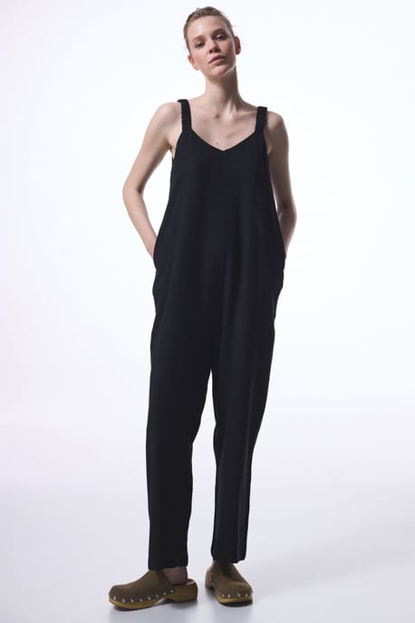 Getailleerde V-hals Rechtaflopende Jumpsuit Met Zakjes - Image 1