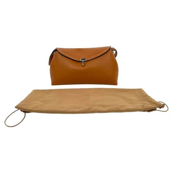 Totême T-Lock Grained-Leather Clutch in Tan Brown Leather - Image 6