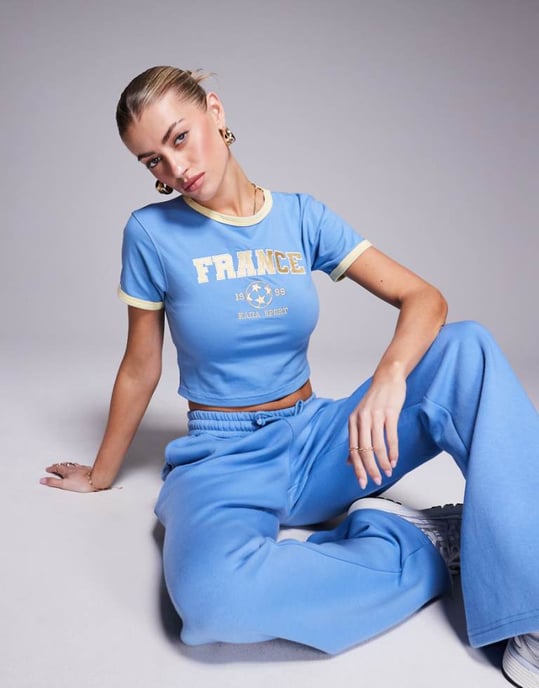 Kaiia bomullsrik sport t-shirt med kontrastfärger i blått och gult för bebisar - Image 1