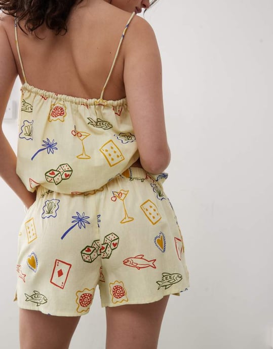 Reclaimed Vintage pull on relaxed beach short in yellow postcard print - Image 1