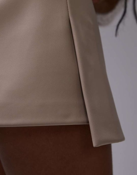 Topshop Petite faux leather step hem mini skirt in fawn - Image 4