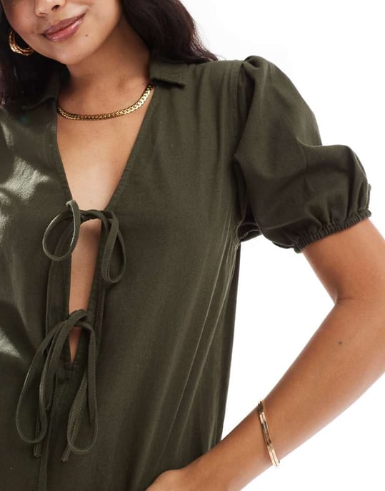 ASOS DESIGN dropped drawstring pocket playsuit with puff sleeve detail in dark olive - Image 4