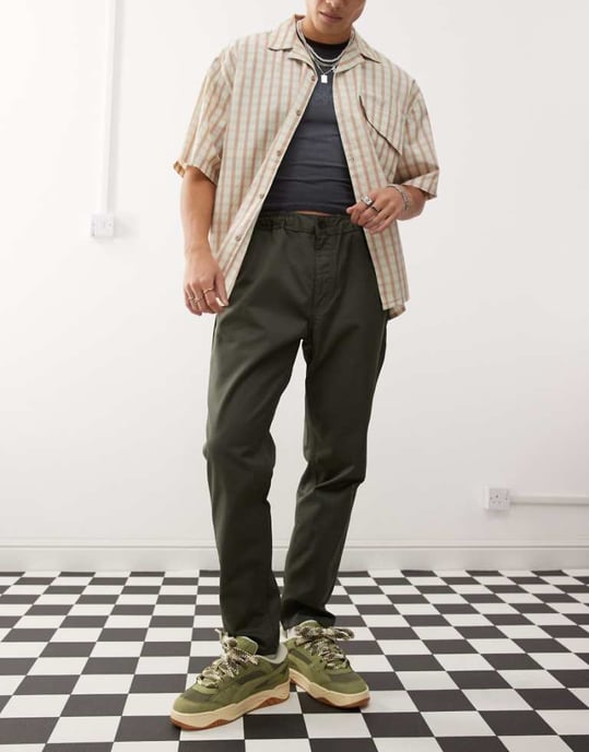 Dr Denim Rush tailored tapered leg chino pant with elastic waistband and drawstring in forest green - Image 1