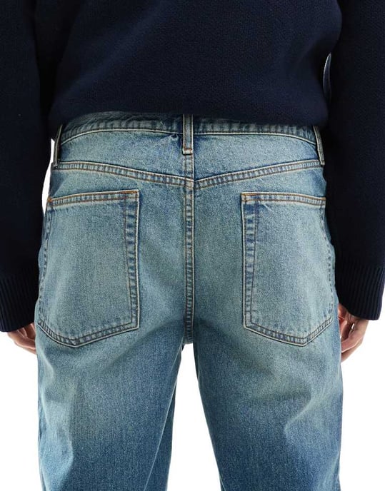 ASOS DESIGN straight leg jeans in tinted vintage light wash blue - Image 4